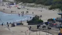 Darłowo - widok na plaże i morze oraz wejście do portu.