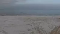 Kamera z widokiem na szeroką plażę w Dębkach województwo pomorskie.