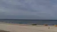 Kamera z widokiem na szeroką plażę w Dębkach województwo pomorskie.