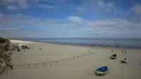 Jantar - widok na złocistą i słoneczną plaże.