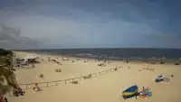 Jantar - widok na złocistą i słoneczną plaże.