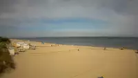 Jantar - widok na złocistą i słoneczną plaże.