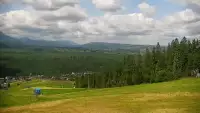 Widok na kolej i panoramę Tatr z Ośrodka Narciarskiego MAŁE CICHE.