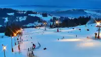 Obraz z kamery na żywo na stację narciarską Rusin-ski oraz panoramę Tatr.