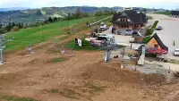 Obraz z kamery na żywo na stację narciarską Rusin-ski oraz panoramę Tatr.