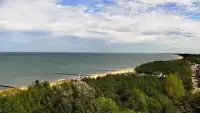 Mielno-Unieście to jeden z najbardziej urokliwych zakątków wybrzeża, gdzie szeroka, złocista plaża spotyka się z leczniczym mikroklimatem. Widok z kamery zainstalowanej na Instytucie Zdrowia Sofra w Mielnie