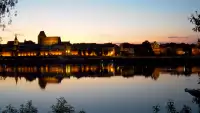 Ciekawe ujęcie na miasto Toruń z kamery zamieszczonej nad rzeką Wisłą.