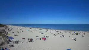 Jantar - widok na złocistą i słoneczną plaże.