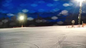 Widok na jedną z tras narciarskich - Kotelnica I oraz na wspaniałe szczyty Tatr