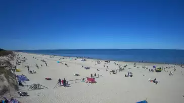 Jantar - widok na złocistą i słoneczną plaże.