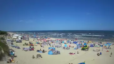 Jantar - widok na złocistą i słoneczną plaże.