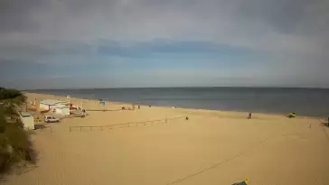 Jantar - widok na złocistą i słoneczną plaże.