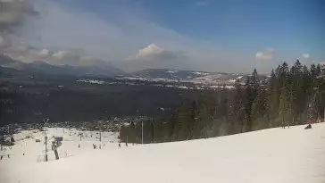 Widok na kolej i panoramę Tatr z Ośrodka Narciarskiego MAŁE CICHE.