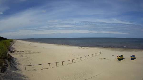 Jantar - widok na złocistą i słoneczną plaże.