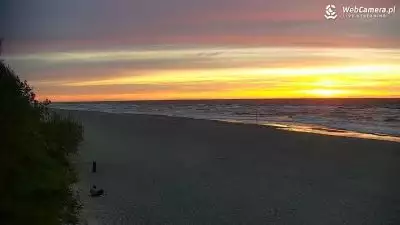 Ujęcie z kamery na zachodzące słońce w Grzybowie. Błękitna Flaga - Ranking plaż 2020r