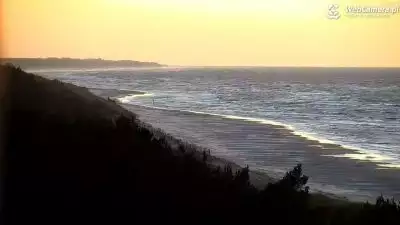 Widok na plażę przy zachodzącym słońcu - KAMERA LIVE